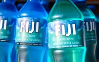 Fiji water bottles recalled due to contamination concerns, showcasing a recall notice prominently.