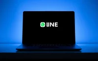 Download the LINE desktop version interface on a sleek laptop showcasing its user-friendly design.